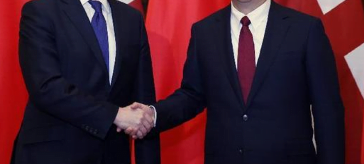 uKasianbankhandshake.png